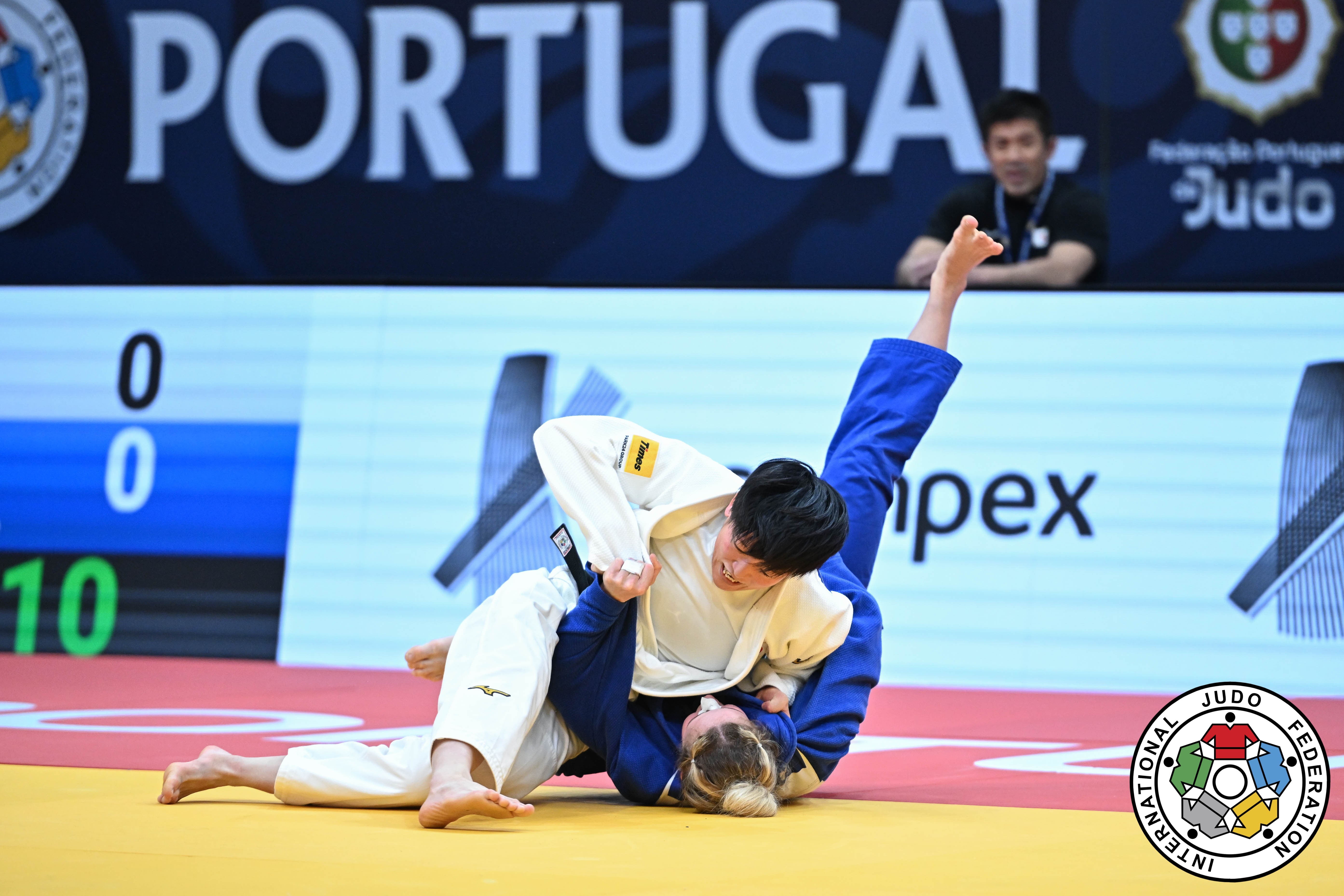 57kg: Huh Takes Gold With a Recipe of Pace and Precision