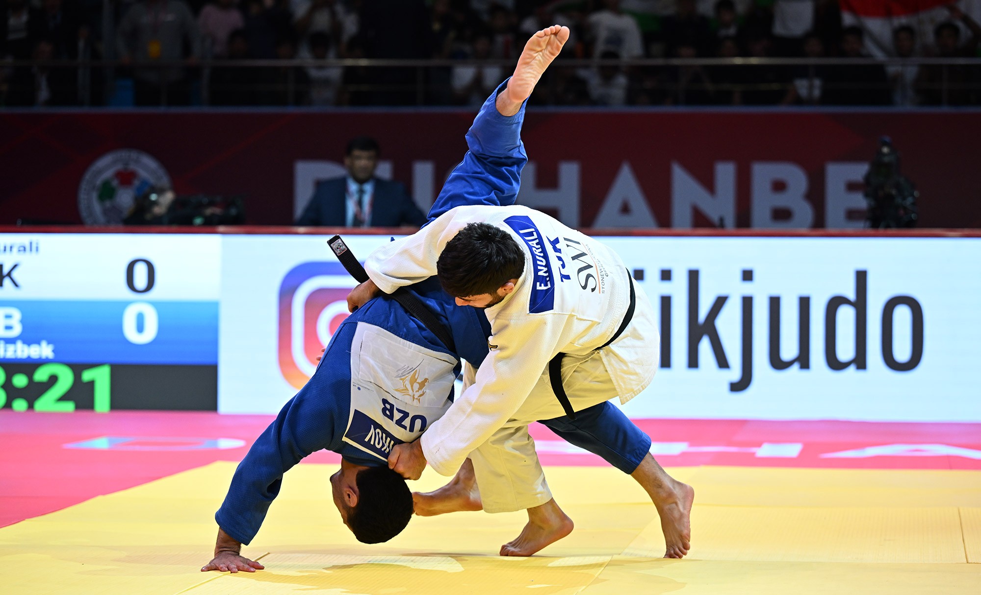 -66 kg: Emomali Excels at Home